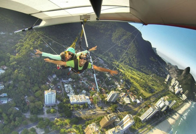 Hang Gliding in Rio de Janeiro Brazil with experienced hang gliders instructors. Tandem Flight in Rio is a unforgettable experience. Book Now!